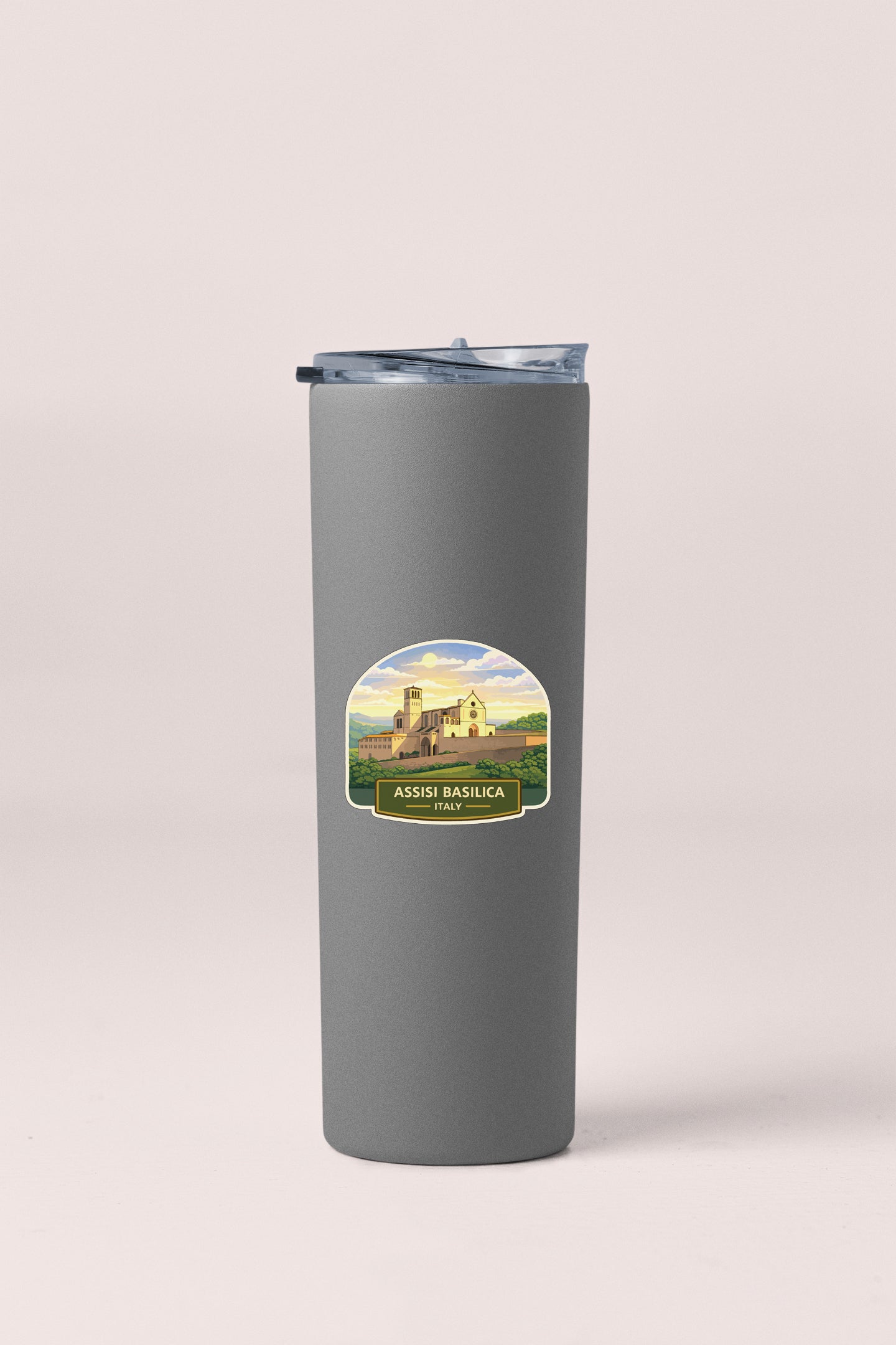 A gray insulated tumbler with a label that says "Assisi Basilica Italy" on it.