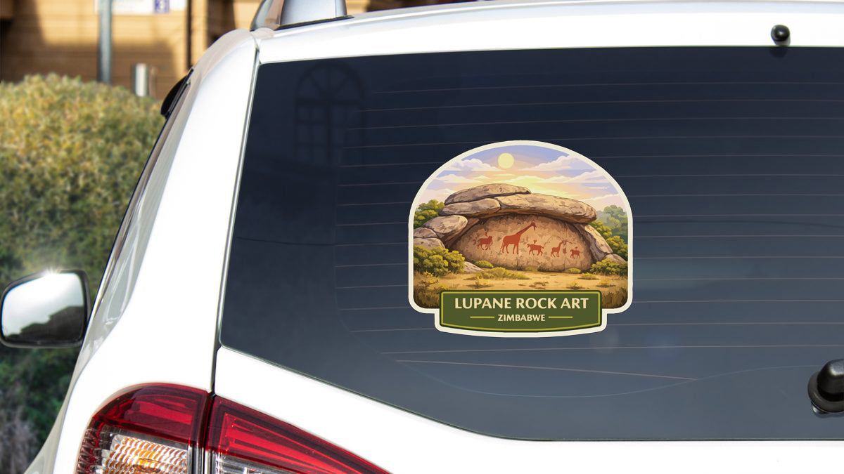 a sticker on the rear window of a car that displays a rock art scene with a cave and animals.