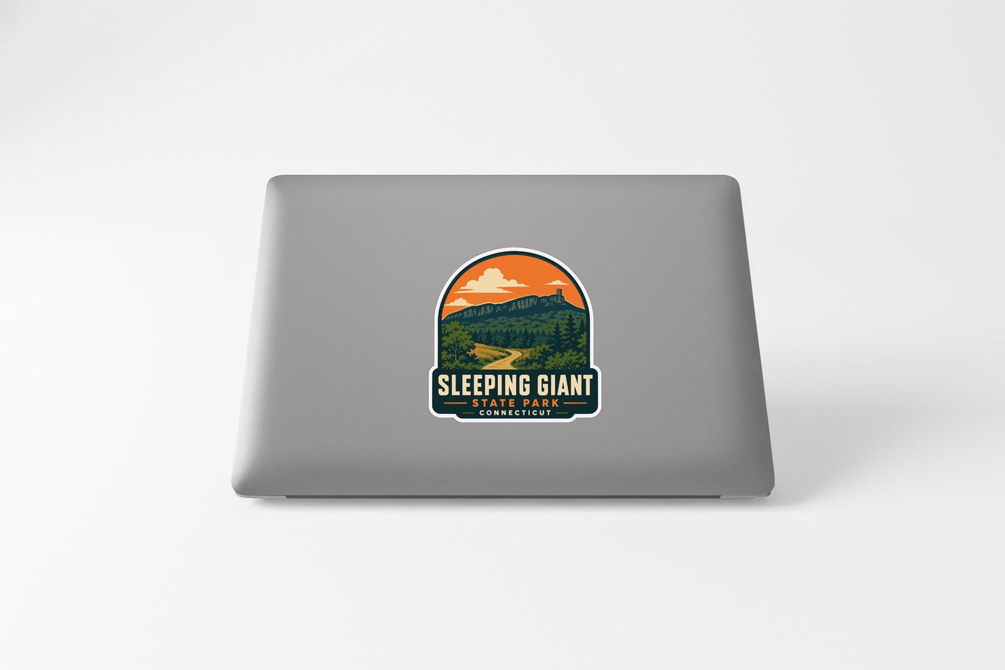 a sticker with a scenic landscape and the text "SLEEPING GIANT STATE PARK" on a laptop.