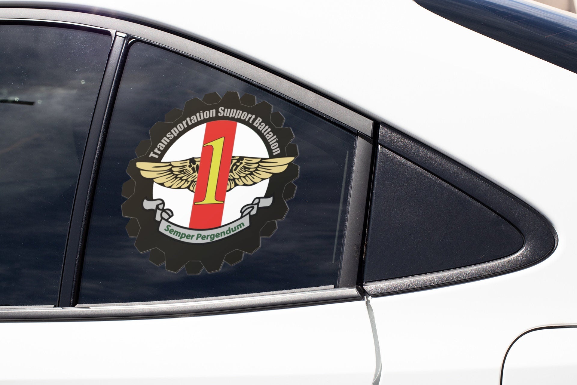 a close up of a car window with a sticker on it