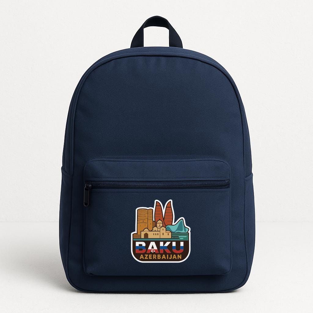 A navy blue backpack with a sticker on the front that says "BAKU AZERBAJAN".