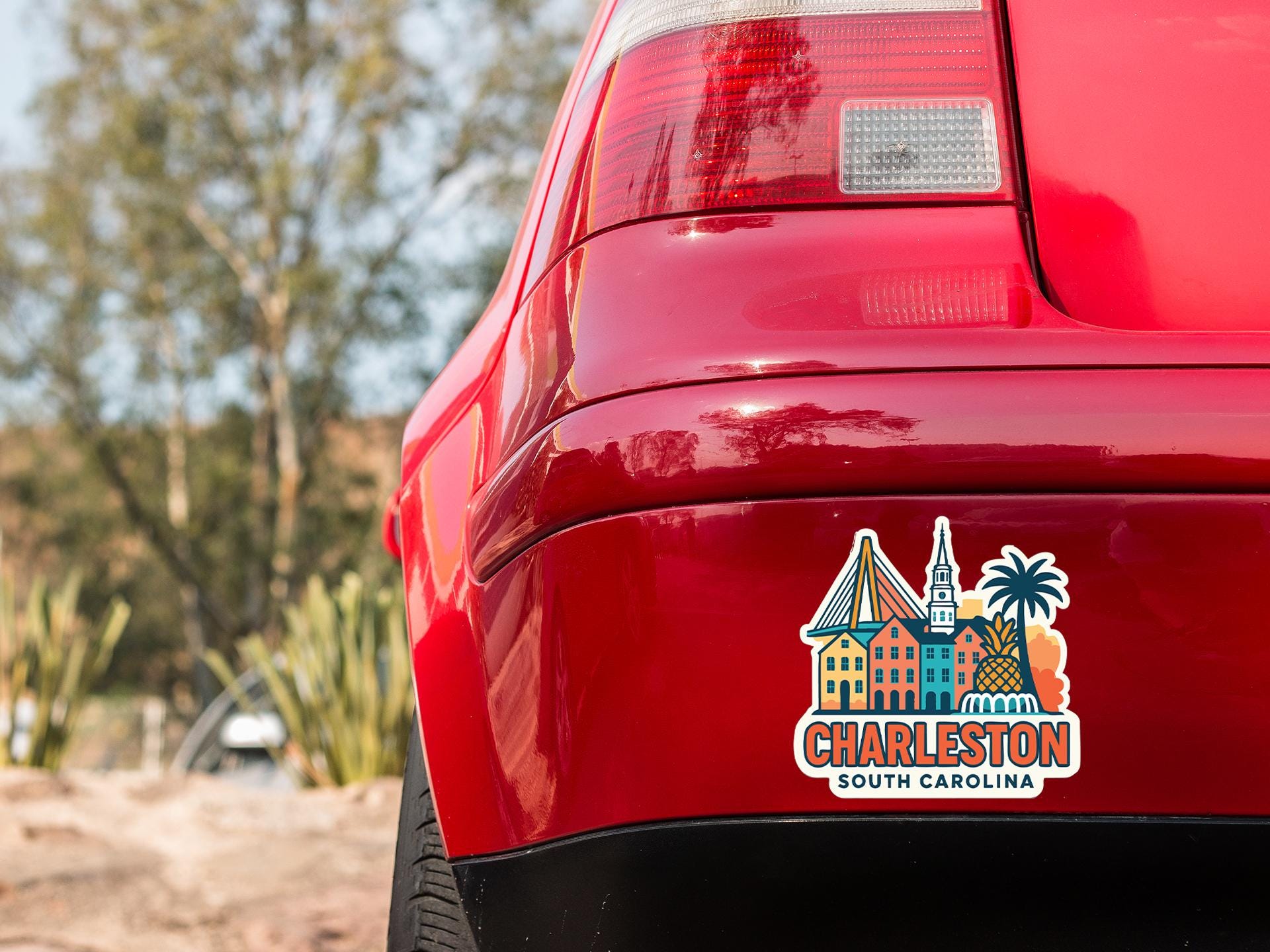a red car with a sticker on it