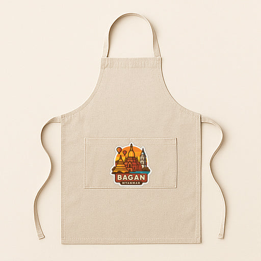 A beige apricot with a graphic of a city skyline on the front pocket.