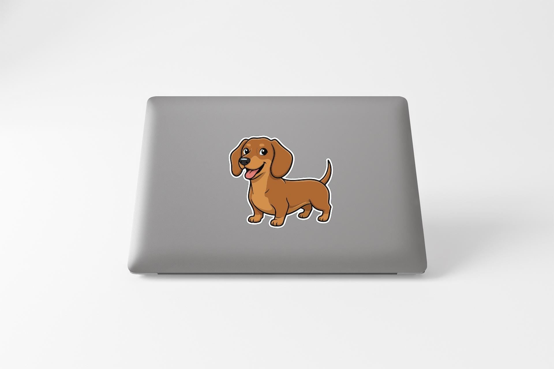 A cartoon illustration of a brown dachshund dog on a laptop.