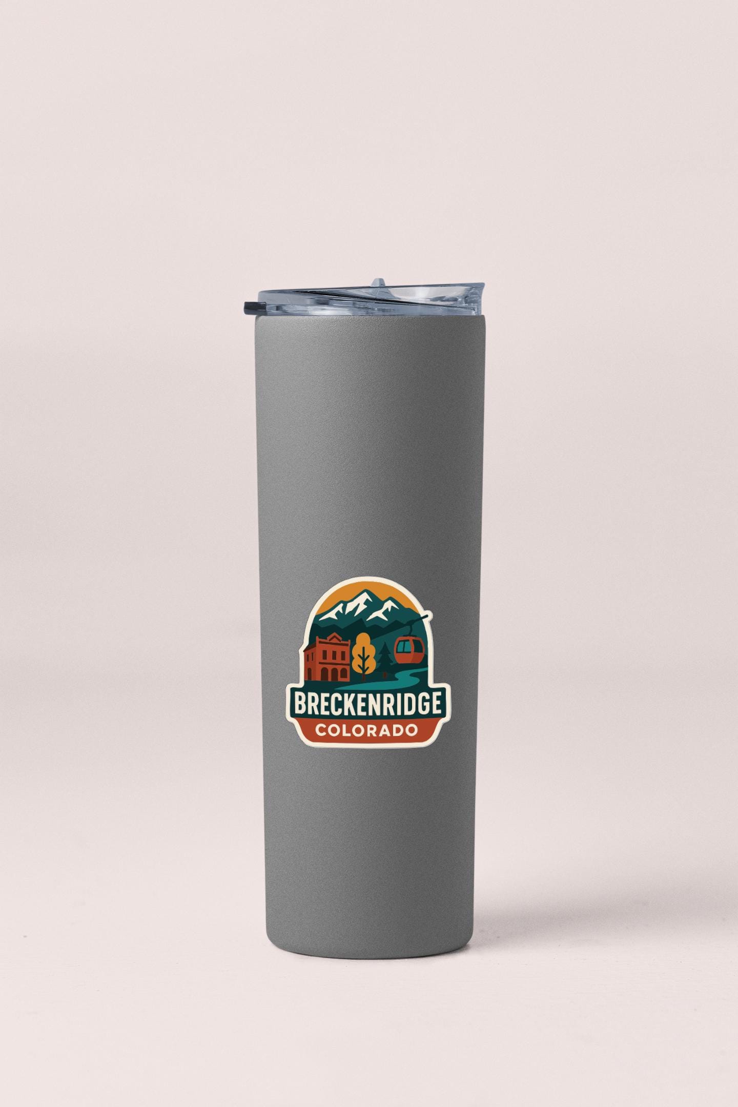A gray insulated tumbler with a logo for Breckenridge, Colorado.