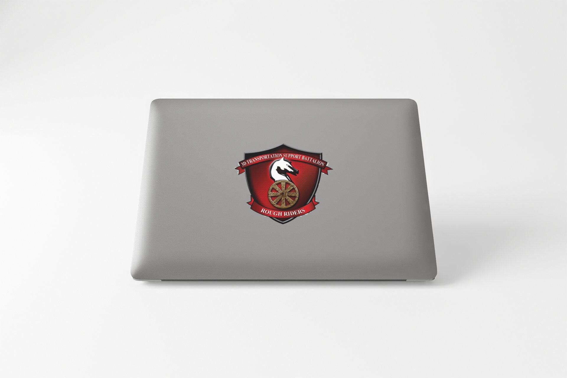 a laptop with a red and white emblem on it
