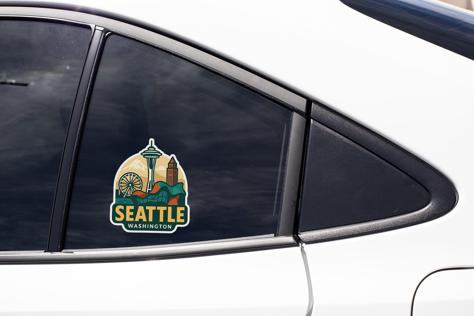 a seattle sticker on the side of a car