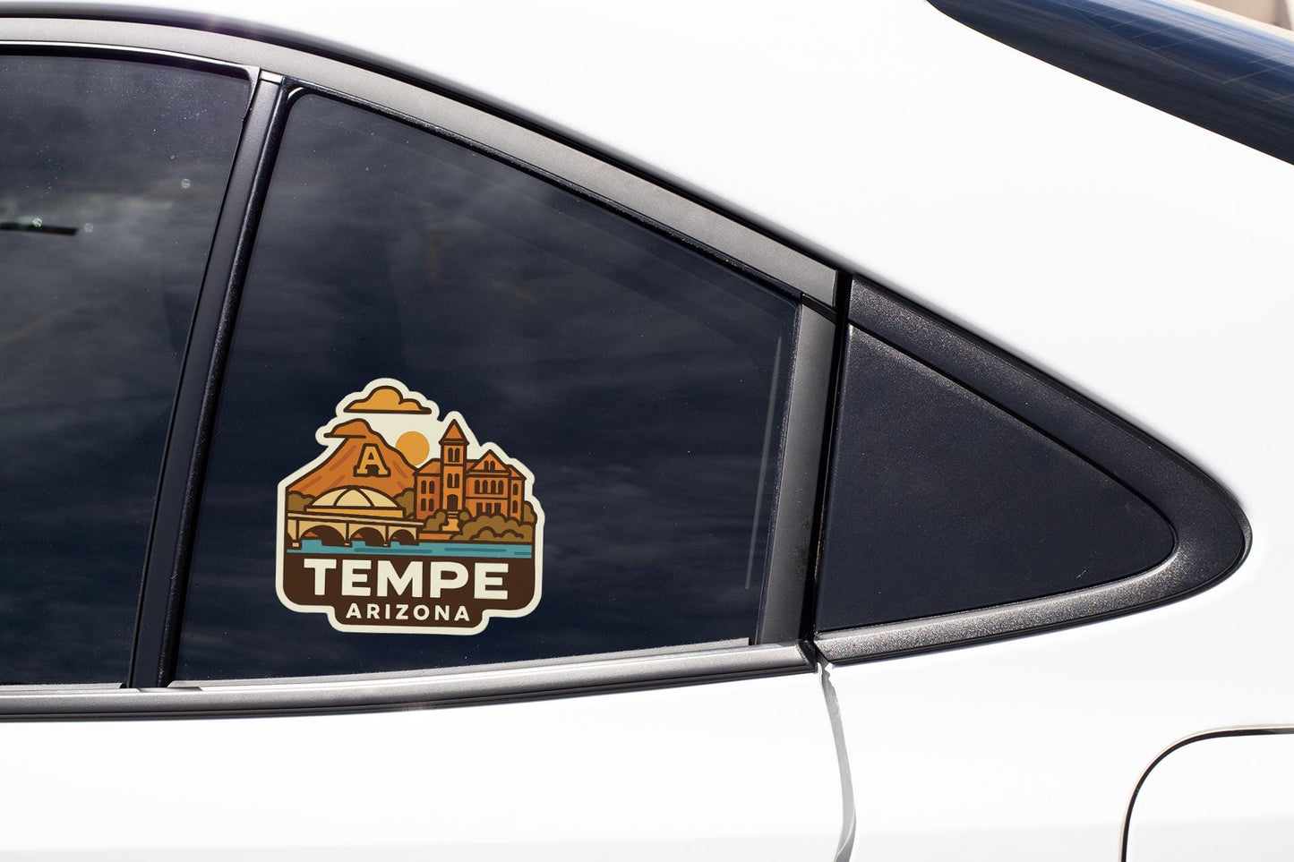 A sticker on the side of a car window that says "TEMPE ARIZONA".