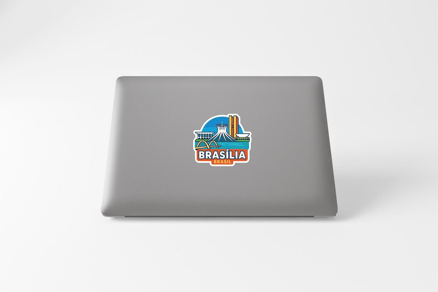 a sticker of Brasilia, the capital city of Brazil, on the back of a laptop.