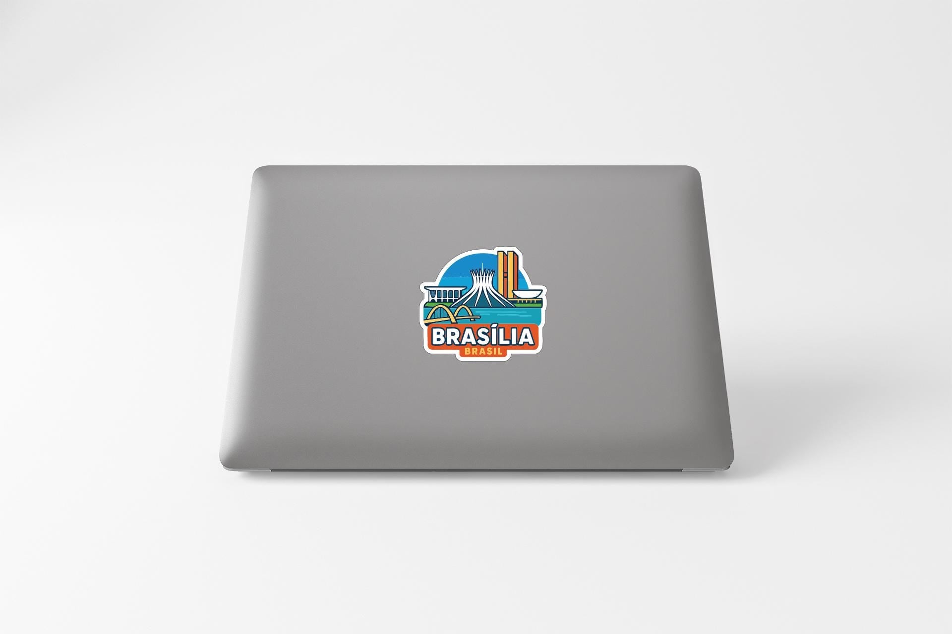 a sticker of Brasilia, the capital city of Brazil, on the back of a laptop.