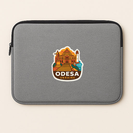 a gray laptop sleeve with a sticker depicting the Odessa, Ukraine, landmark.