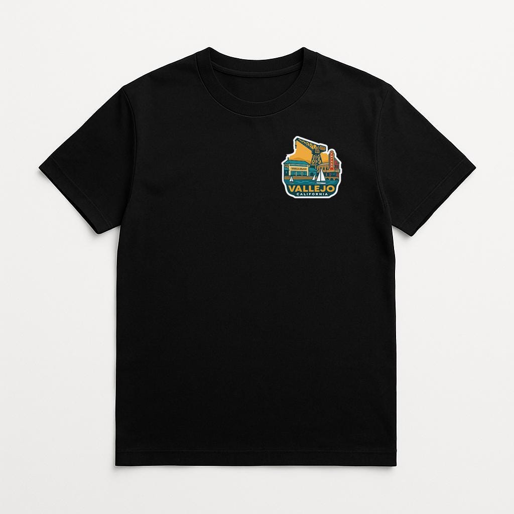 A black t-shirt with a colorful graphic design on the front.