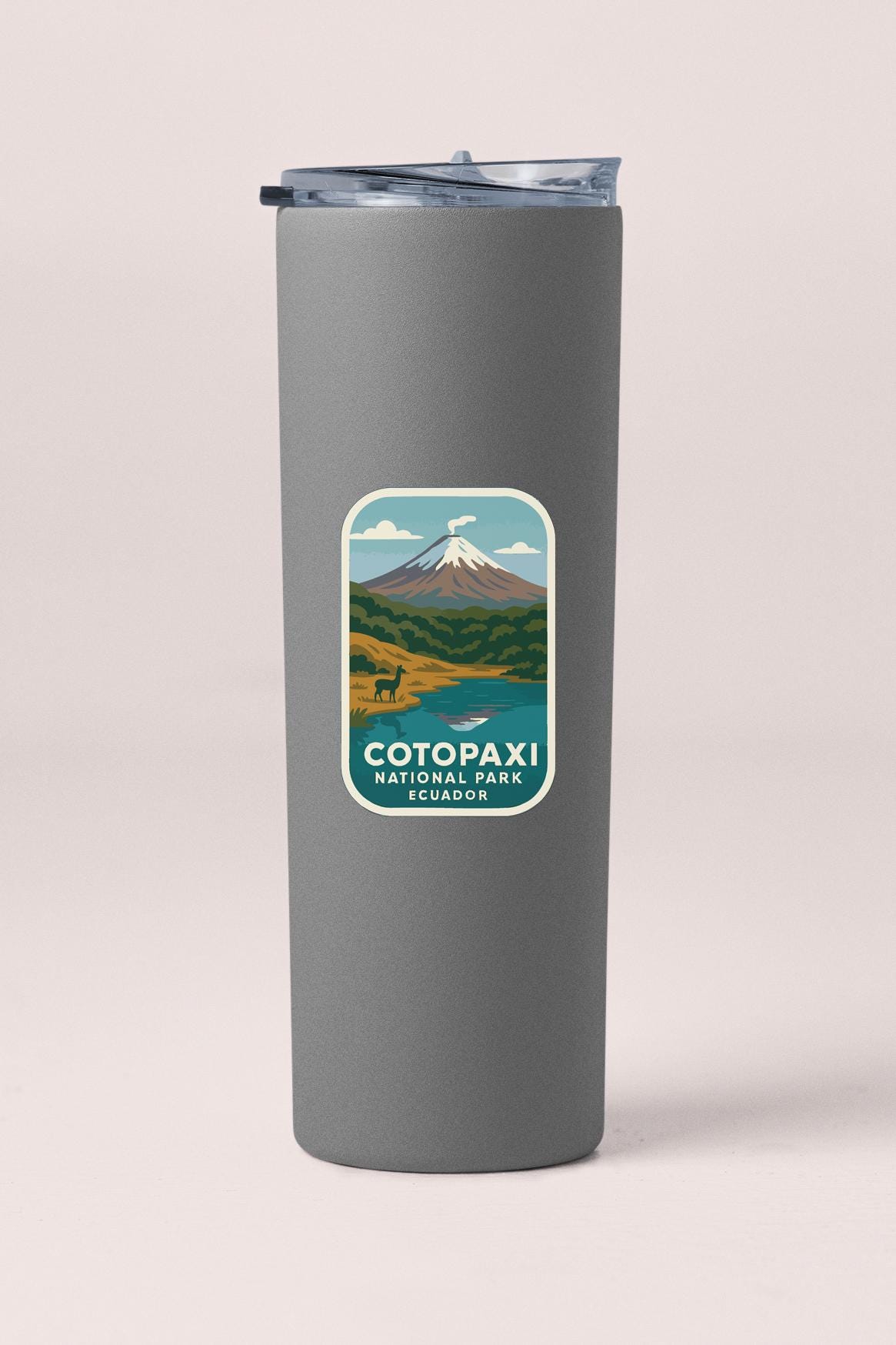 A gray insulated tumbler with a label that says "COTOPAXI NATIONAL PARK ECUADOR".