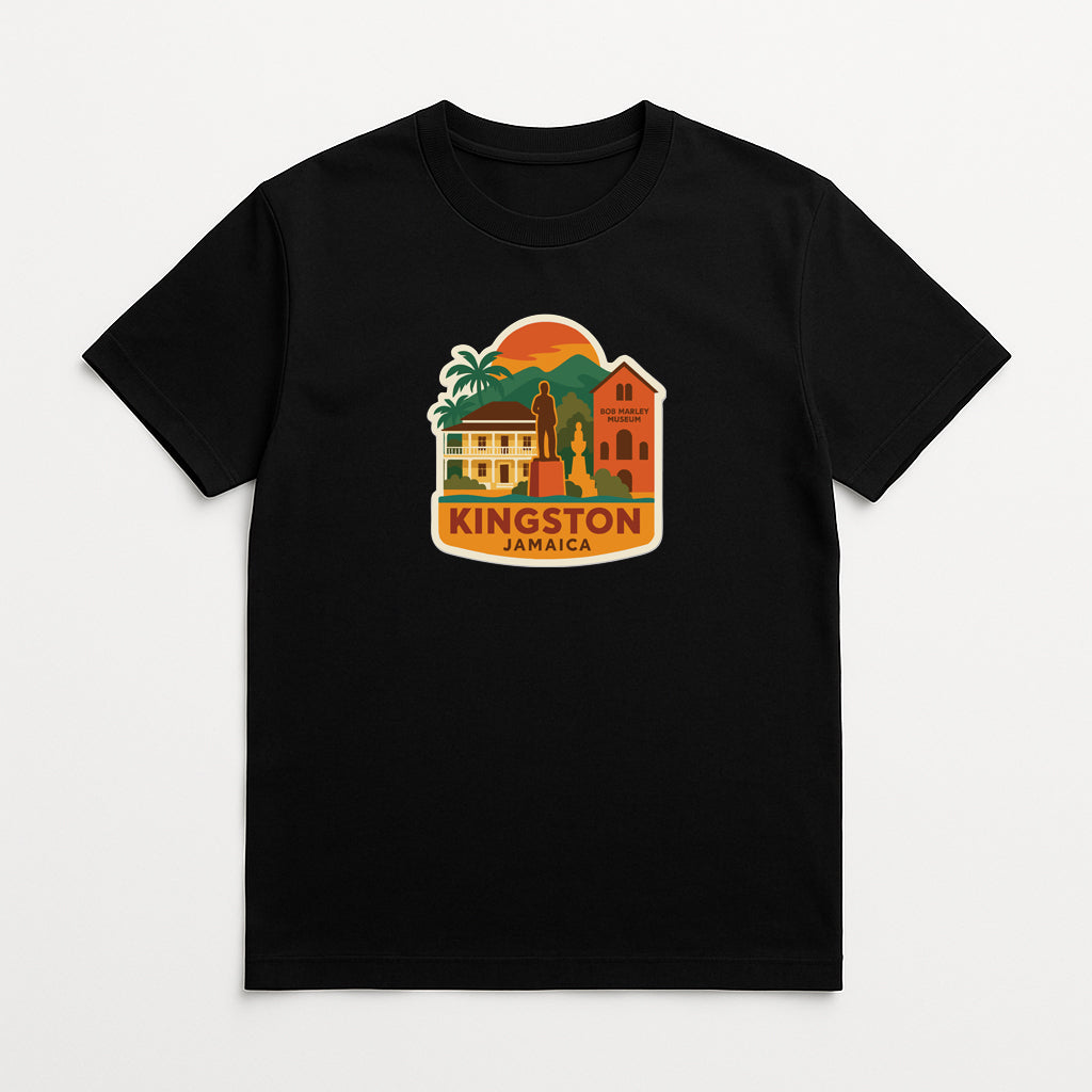 A black t-shirt with a colorful graphic design depicting landmarks and buildings in Kingston, Jamaica.