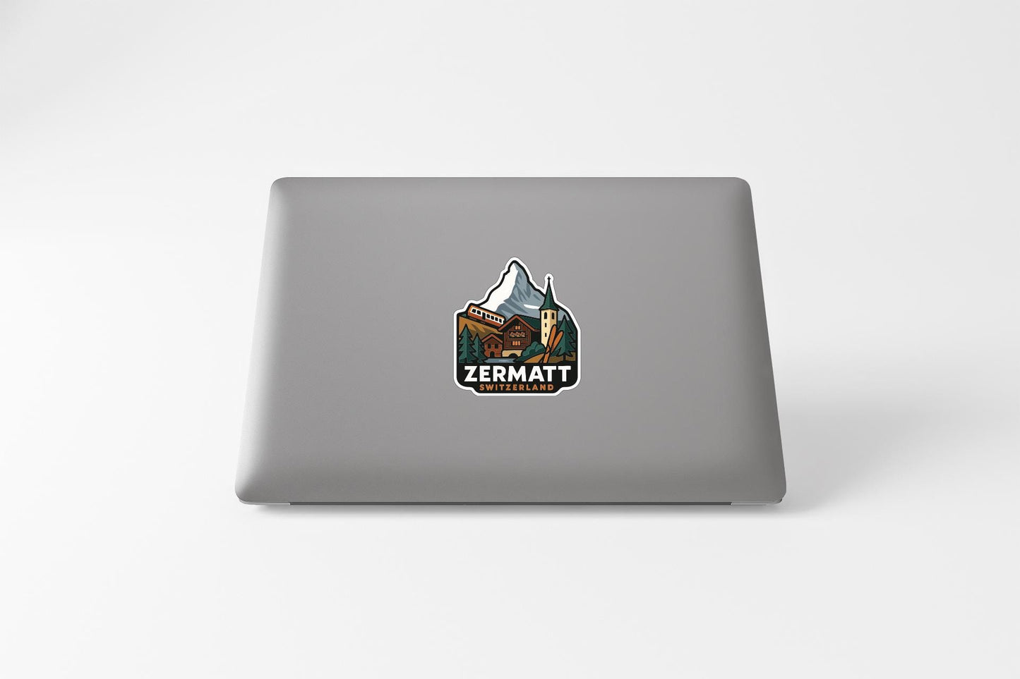 A sticker on the back of a laptop computer.