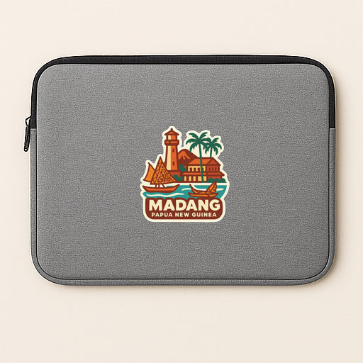 a gray laptop sleeve with a colorful sticker depicting a tropical island with a lighthouse, palm trees, and a boat.