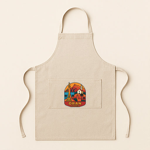 A beige apricot with a colorful graphic of a city skyline and the word "ORAN" printed on it.