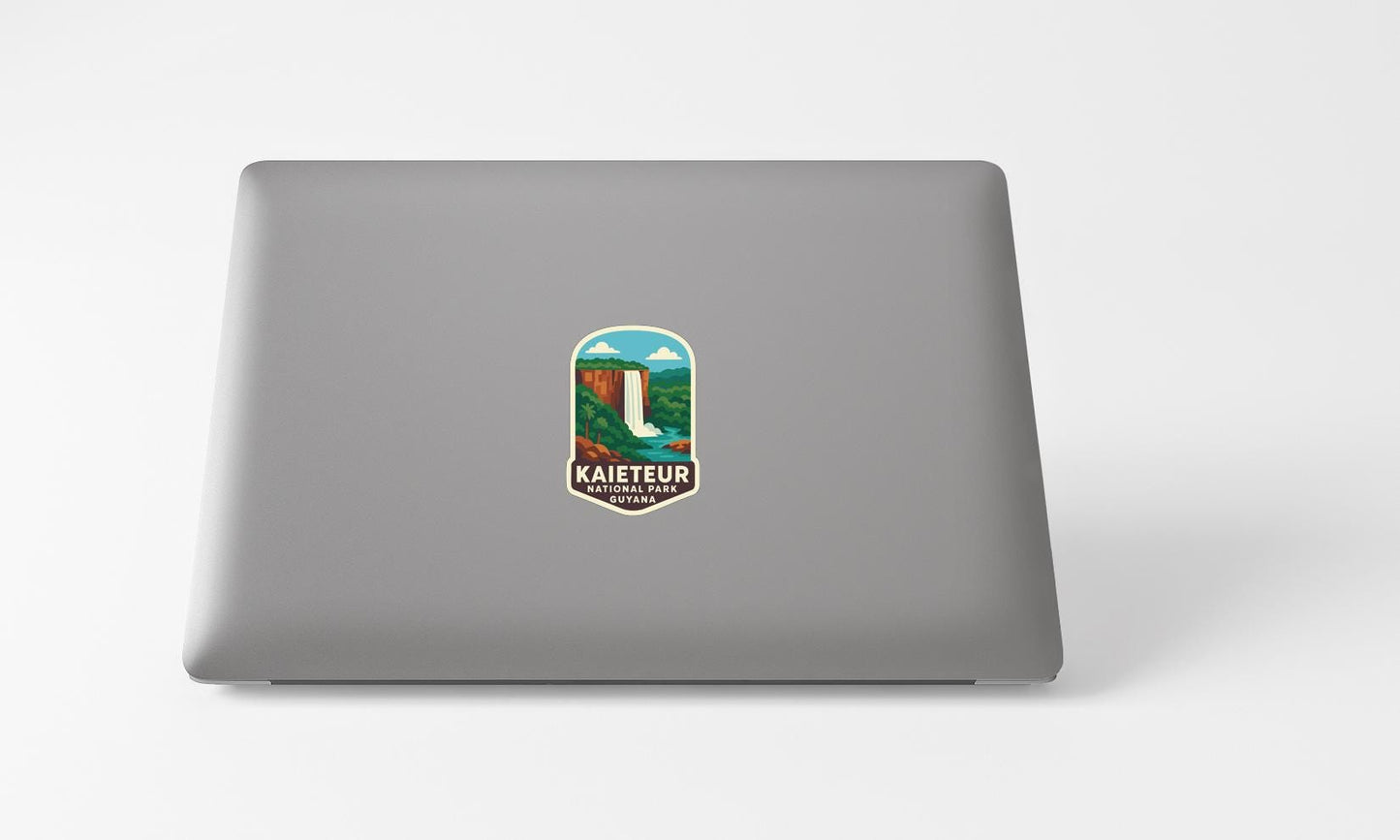 A sticker on the back of a laptop, depicting a waterfall and the text "KAIETEUR KAYATAI".