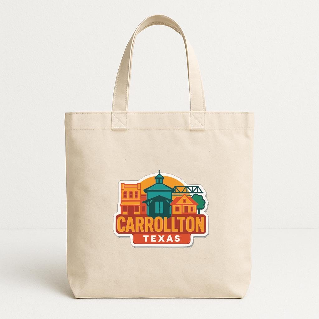 A beige tote bag with a printed design of a cityscape and the text "CARROLLTON TEXAS" on it.