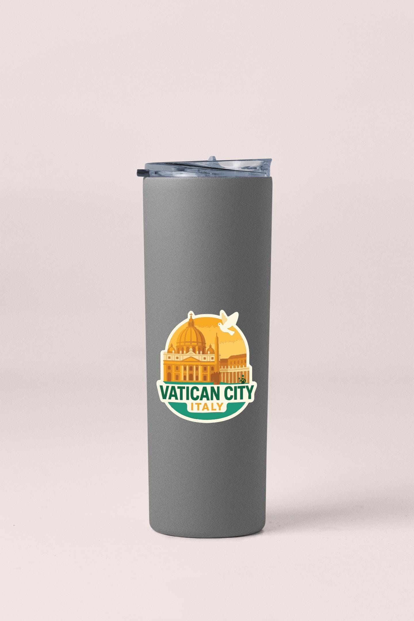 A gray insulated tumbler with a logo that says "VATICAN CITY ITALY".