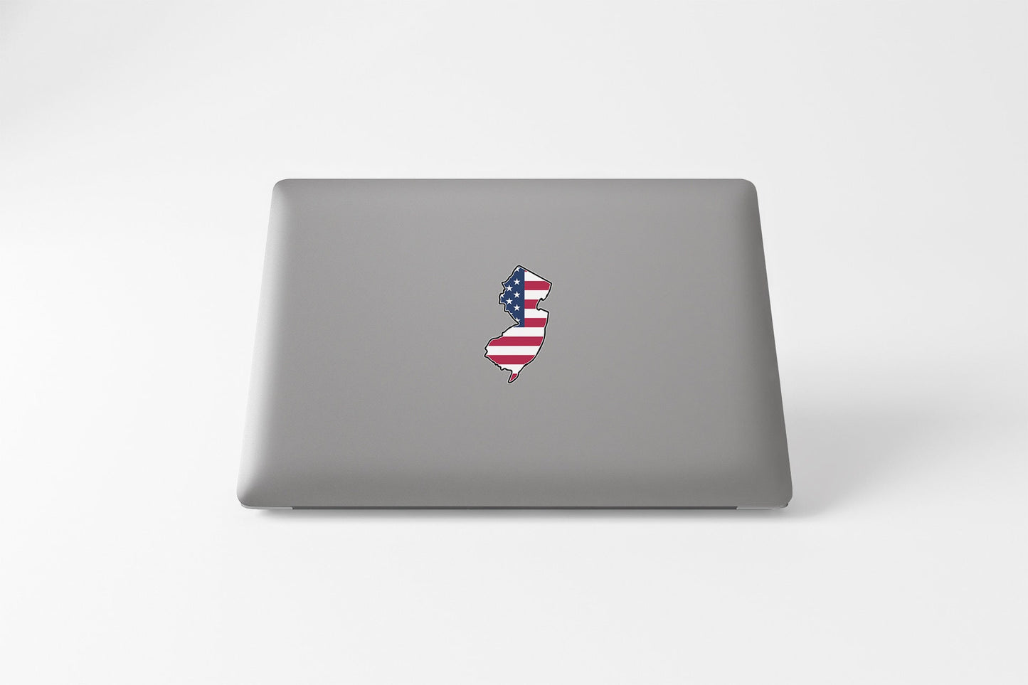 a laptop with a sticker of a map of the united states