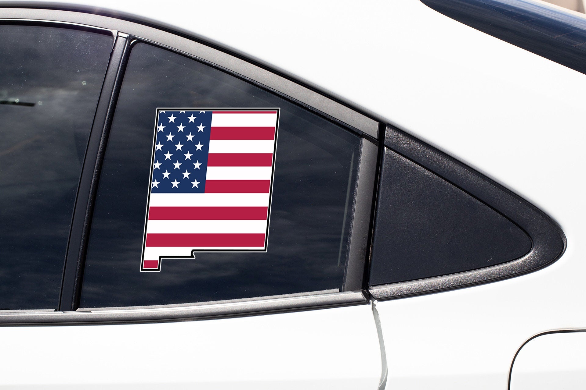 an american flag sticker on the side of a car