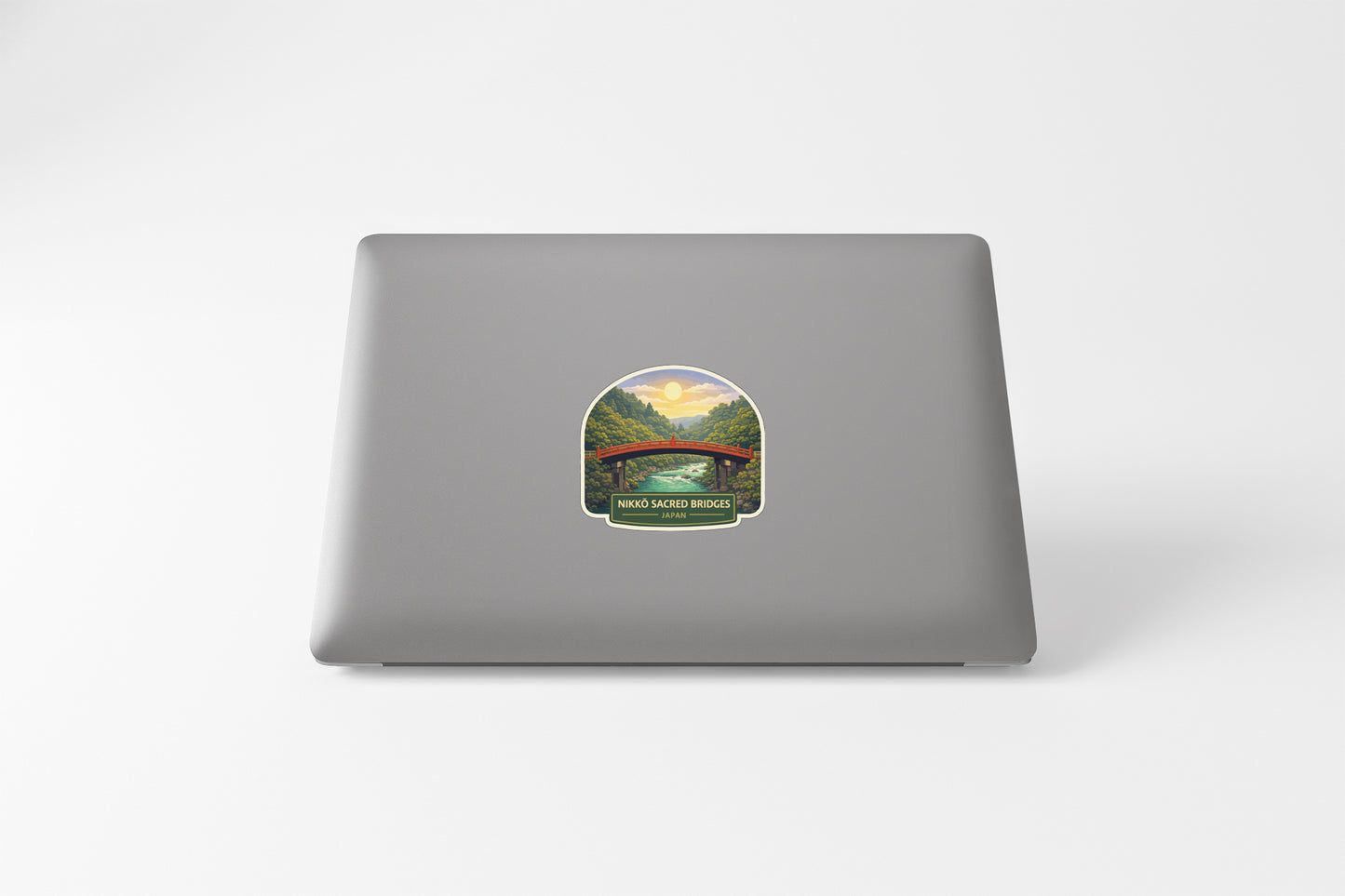 A sticker depicting a scenic landscape with a bridge in the background.