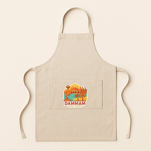 A beige apricot with a graphic design on the front pocket, featuring a cityscape and the text "DAMMAM CHINA'S SOUTH".