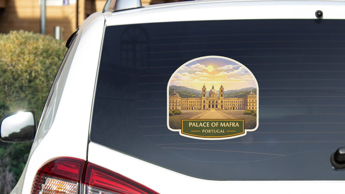 A sticker on the rear window of a car that features the Palace of Marrakech, a famous landmark in Morocco.