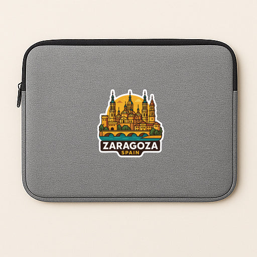 A gray laptop sleeve with a sticker depicting the Zaragózas, a historic city in Spain.