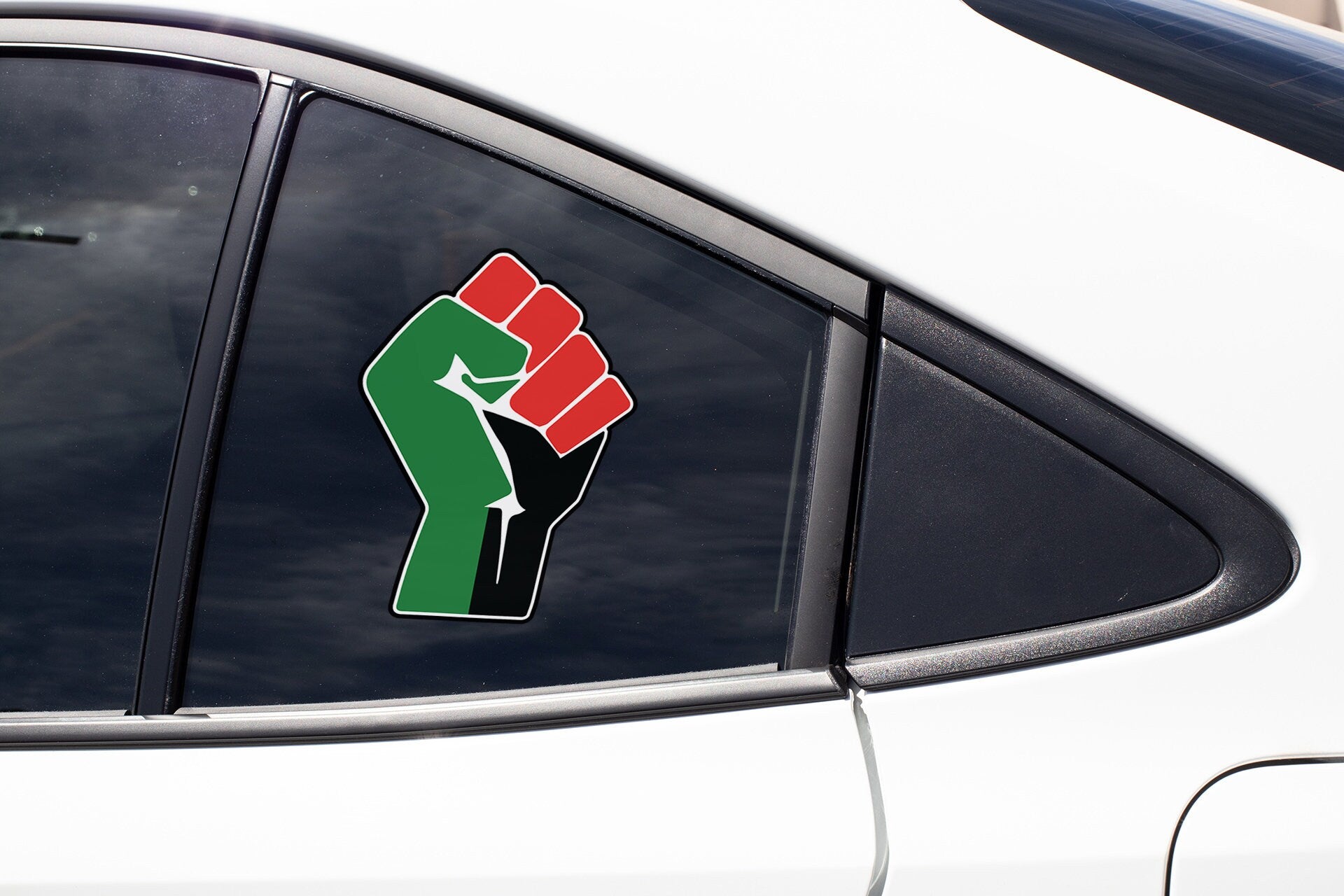 a sticker on the side of a white car