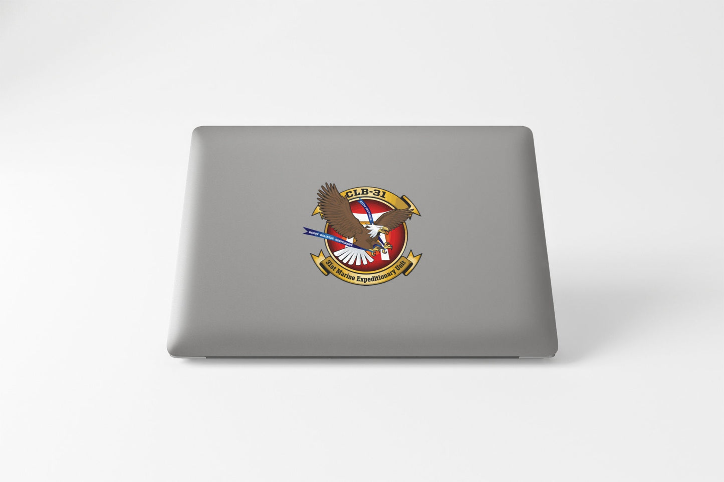 a laptop computer with a military emblem on it
