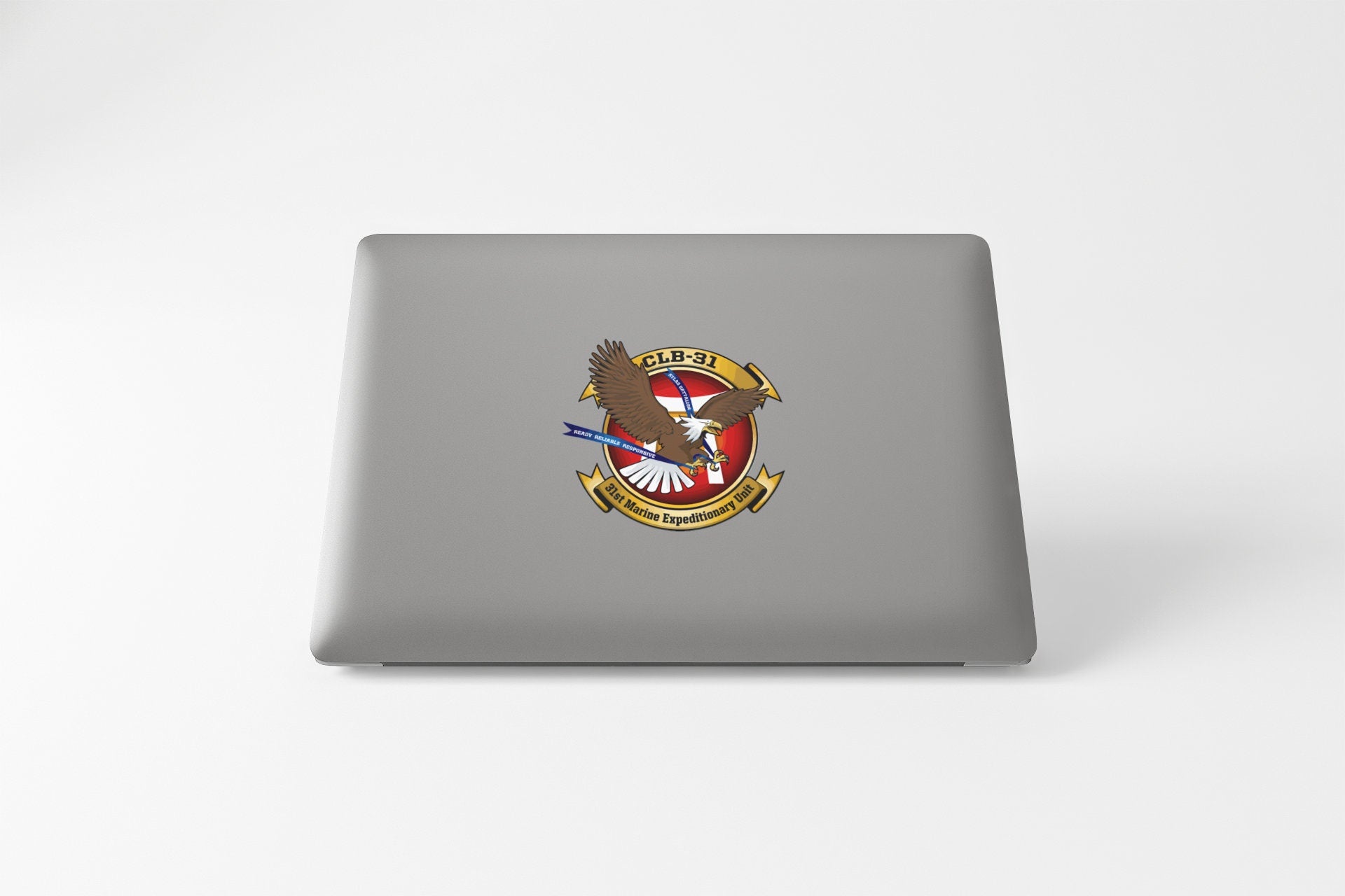 a laptop computer with a military emblem on it