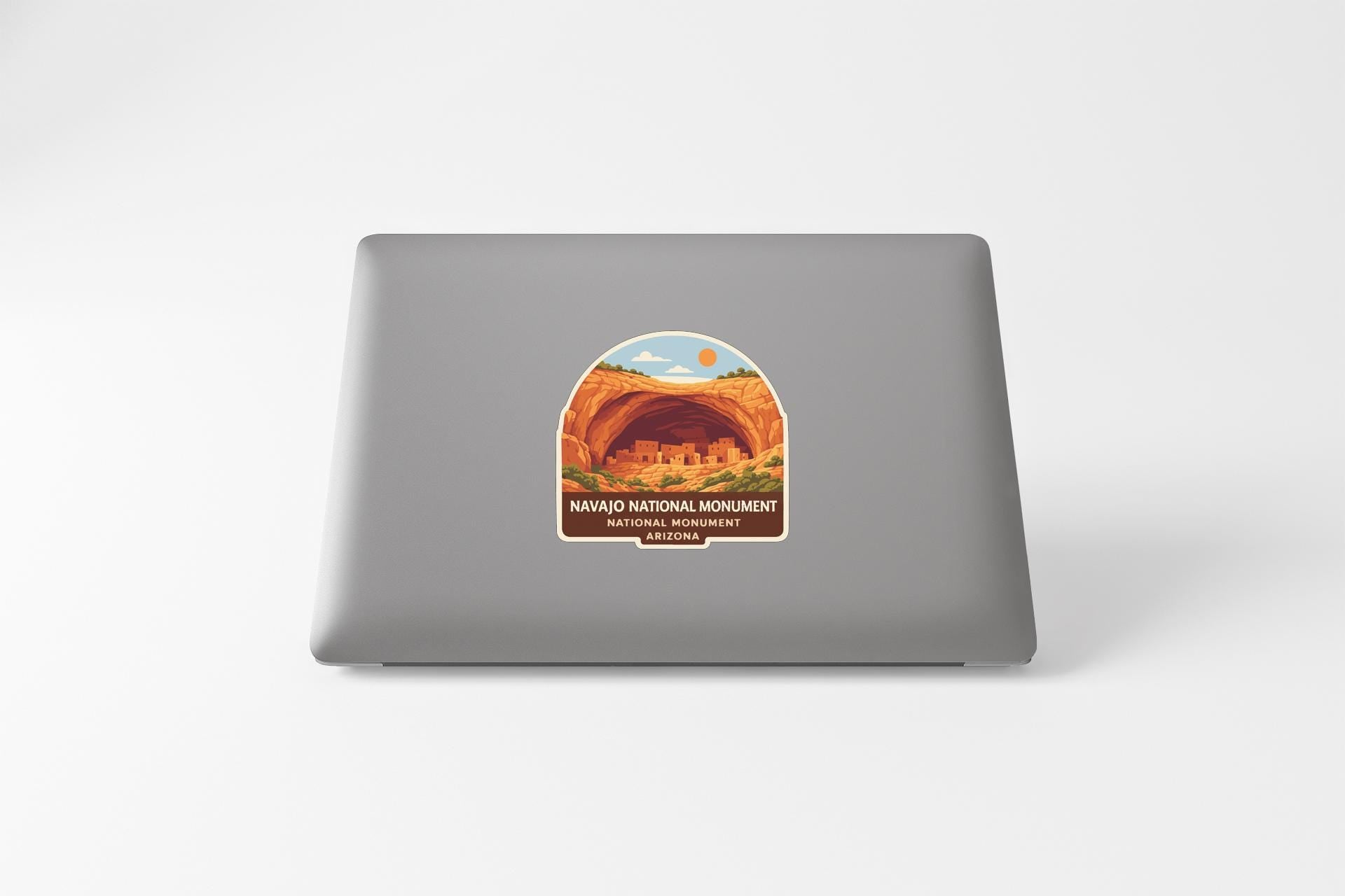 A sticker depicting the Navajo National Monument in Arizona.