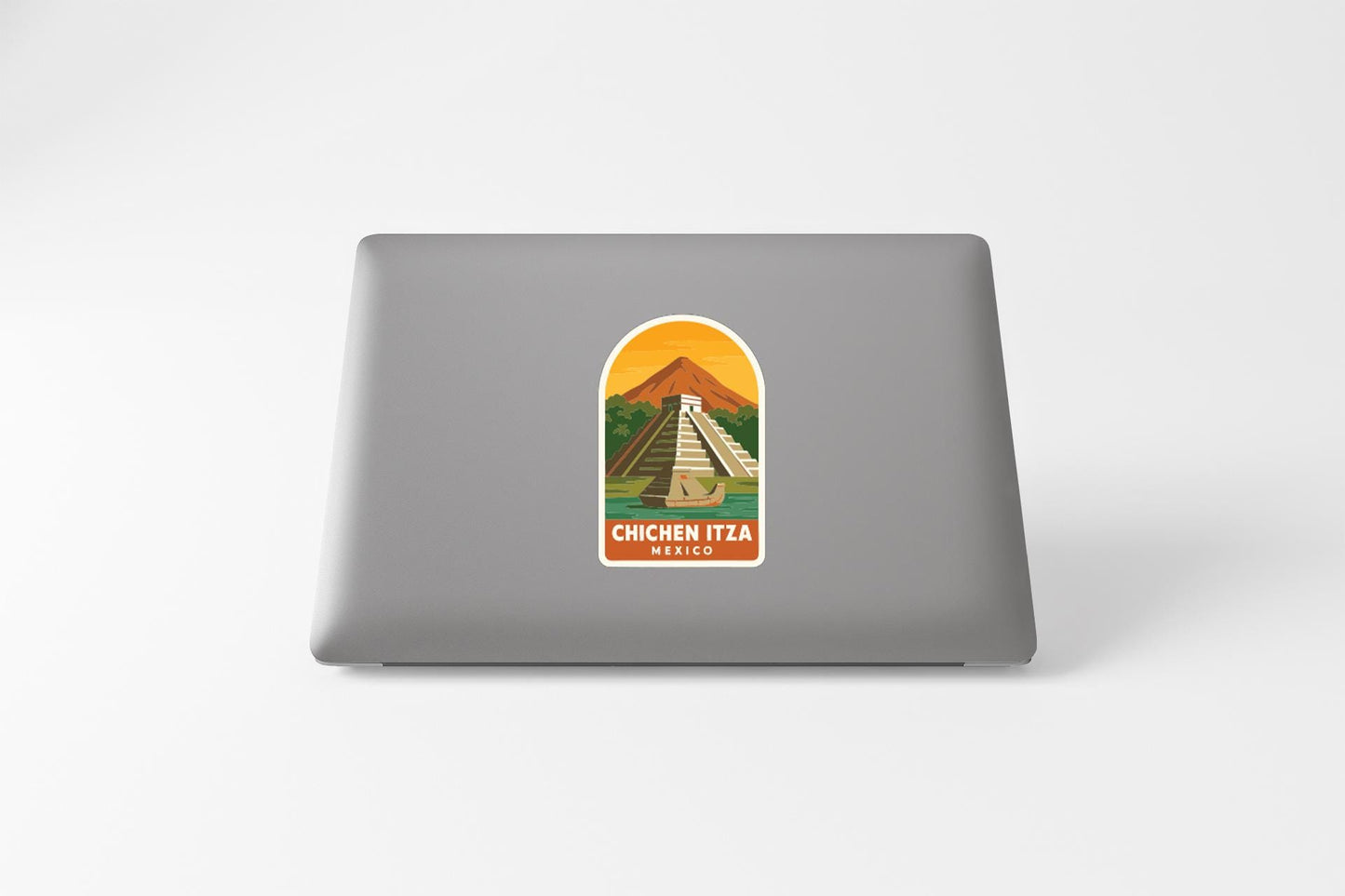 a sticker with an illustration of a pyramid and mountains, along with the text "CHIACEN ITEA MEXICO" printed on it.