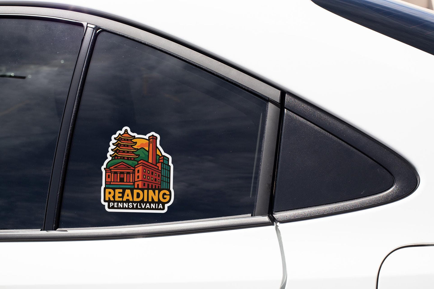A sticker on the side of a car window, depicting a building with a temple-like structure.