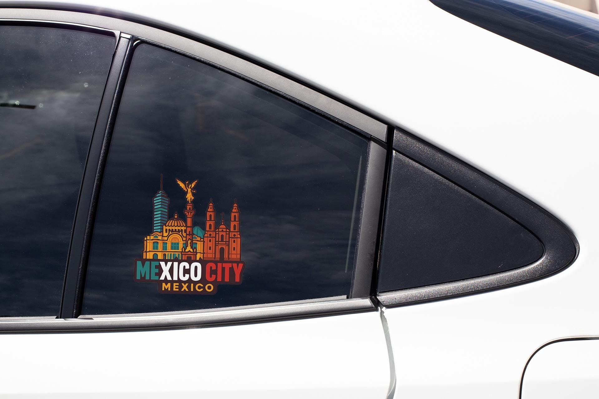 a car with a mexico sticker on it's side window