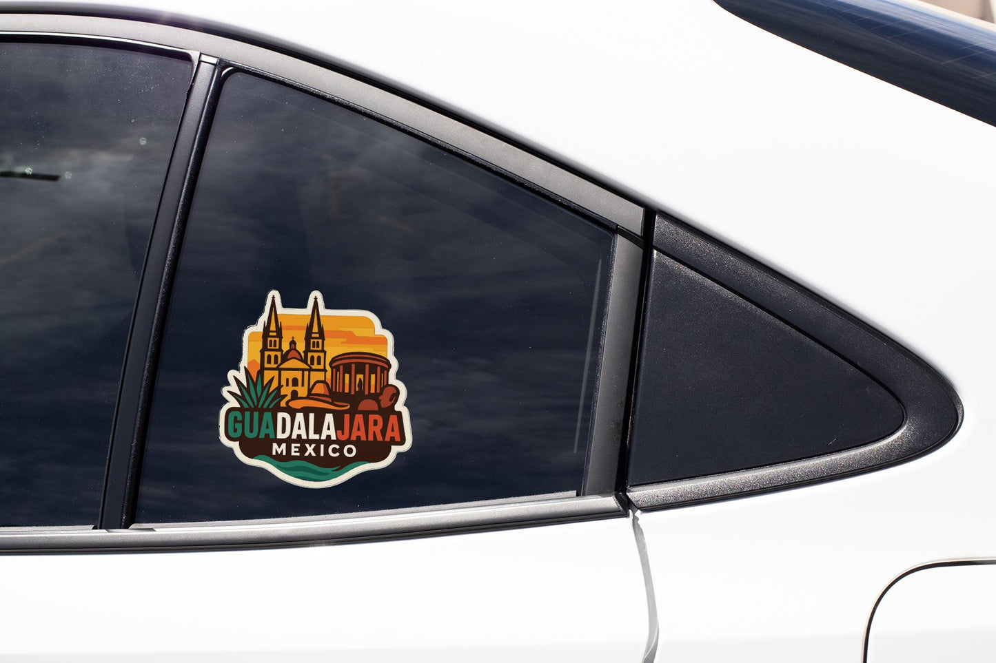 A sticker on the side of a car window, featuring a colorful illustration of a building and the text "GUADALA JARA MEXICO".
