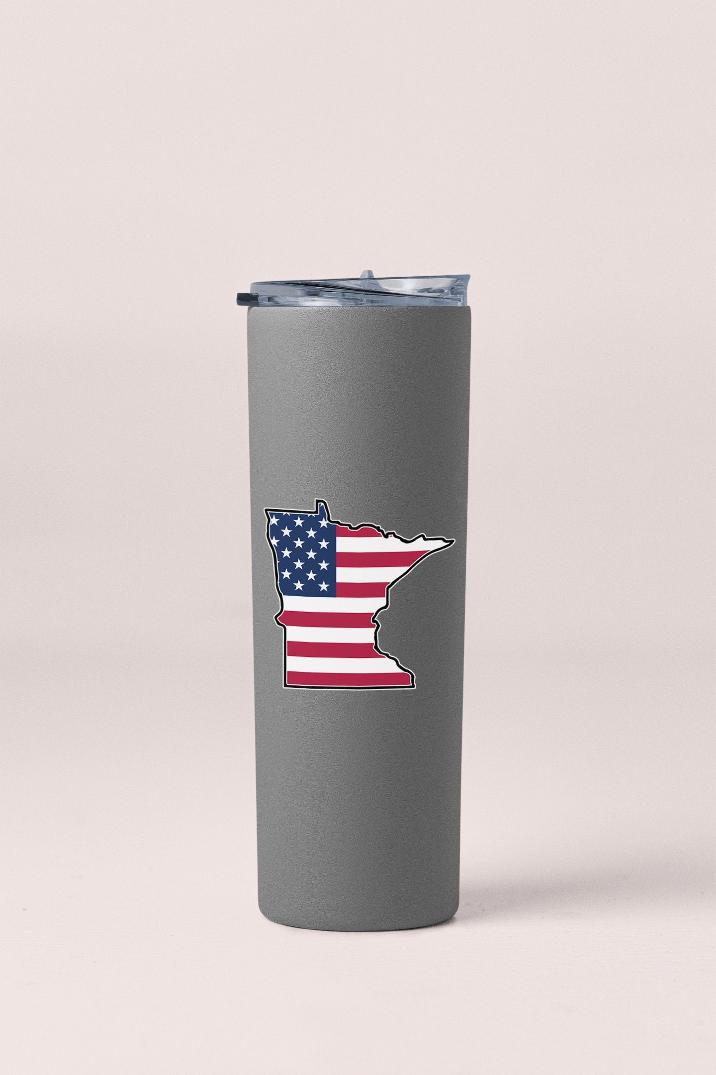 a stainless steel tumbler with a picture of the state of michigan on it