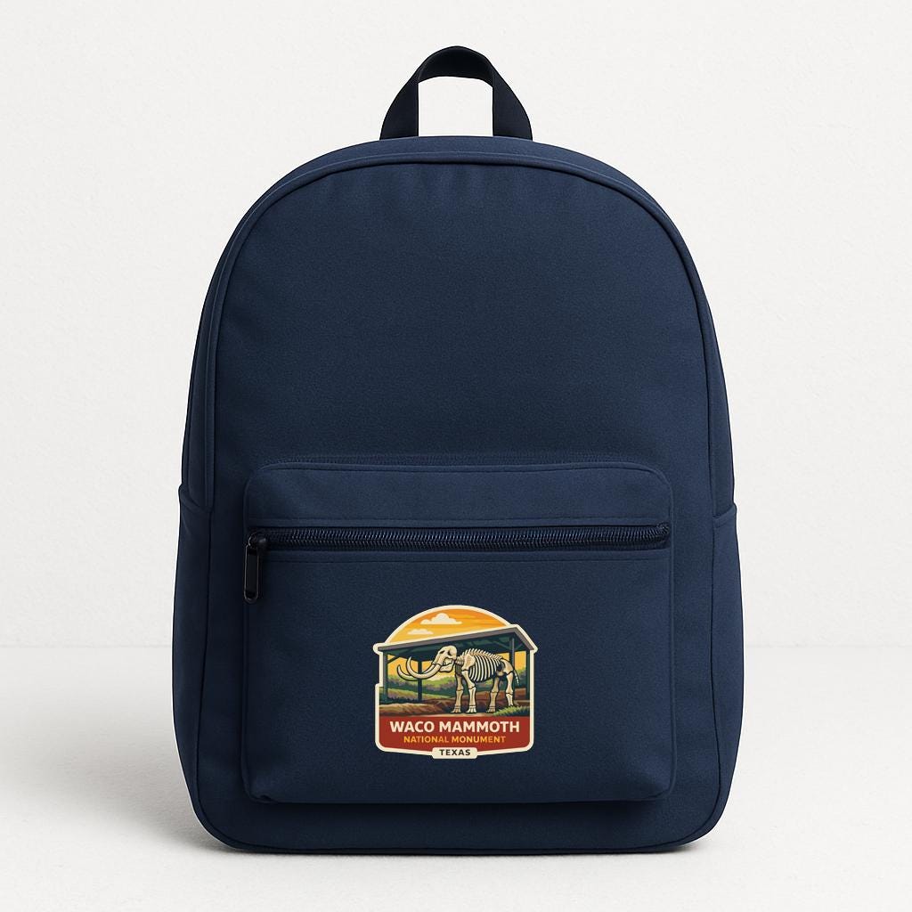 A navy blue backpack with a graphic of a horse and the text "WACO MAMMOTH TEXAS" printed on it.