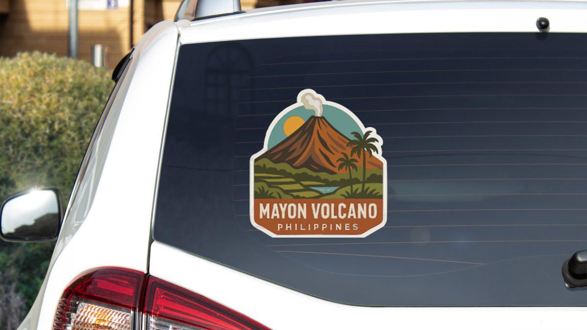 a sticker on the rear window of a car that says "MAYON VOLCANO PHILIPPINES".