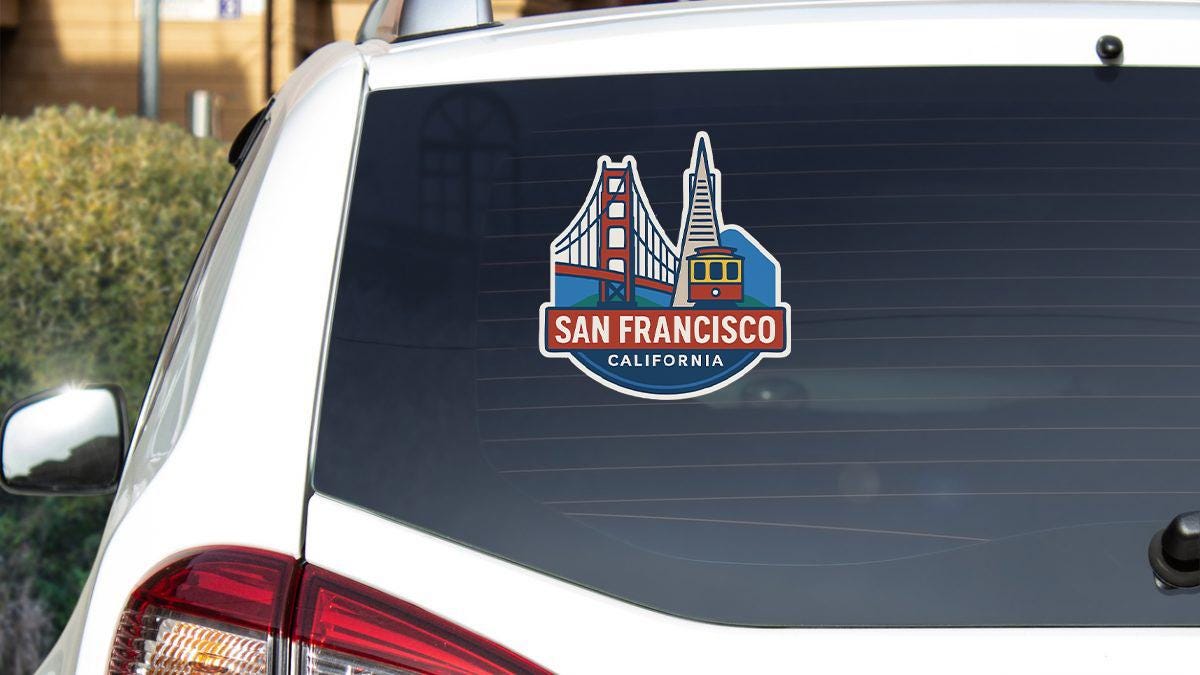 a san francisco sticker on the back of a car