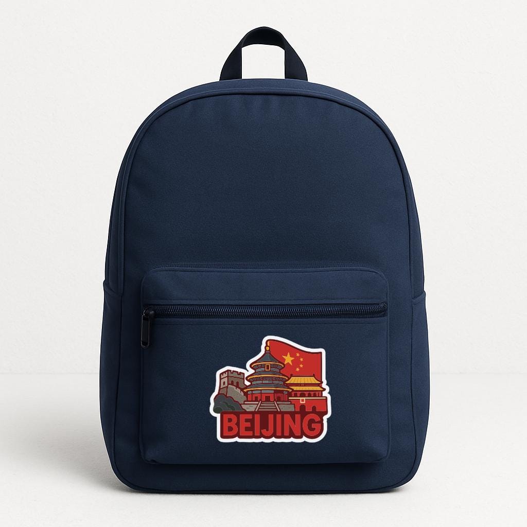 A navy blue backpack with a sticker depicting the Palace of Great Chinese Civilization in Beijing, China.