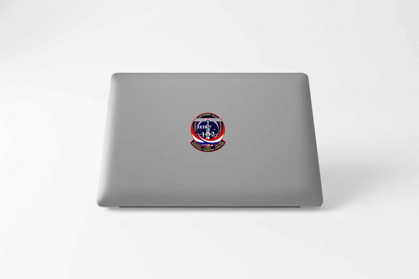 a laptop with a picture of a person's face on it