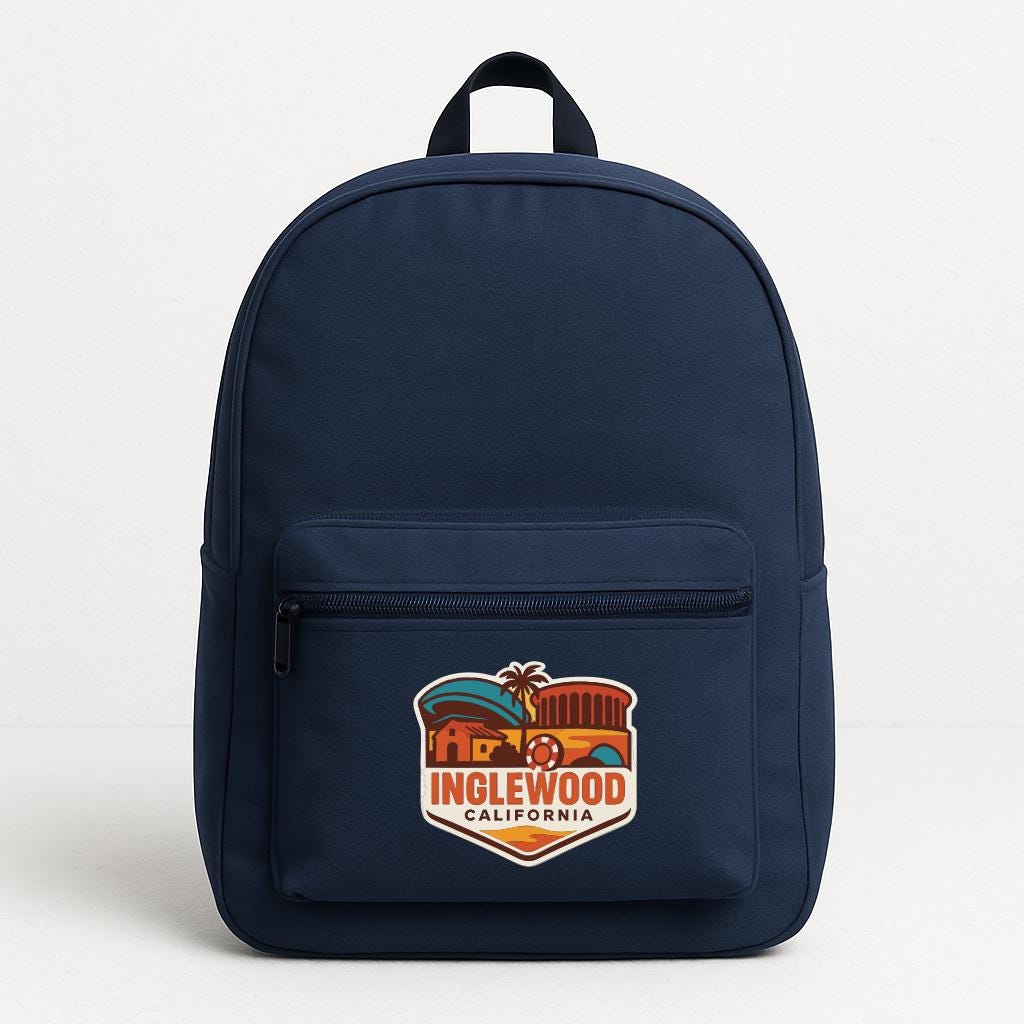 A navy blue backpack with a graphic of the town of Inglewood, California on the front.