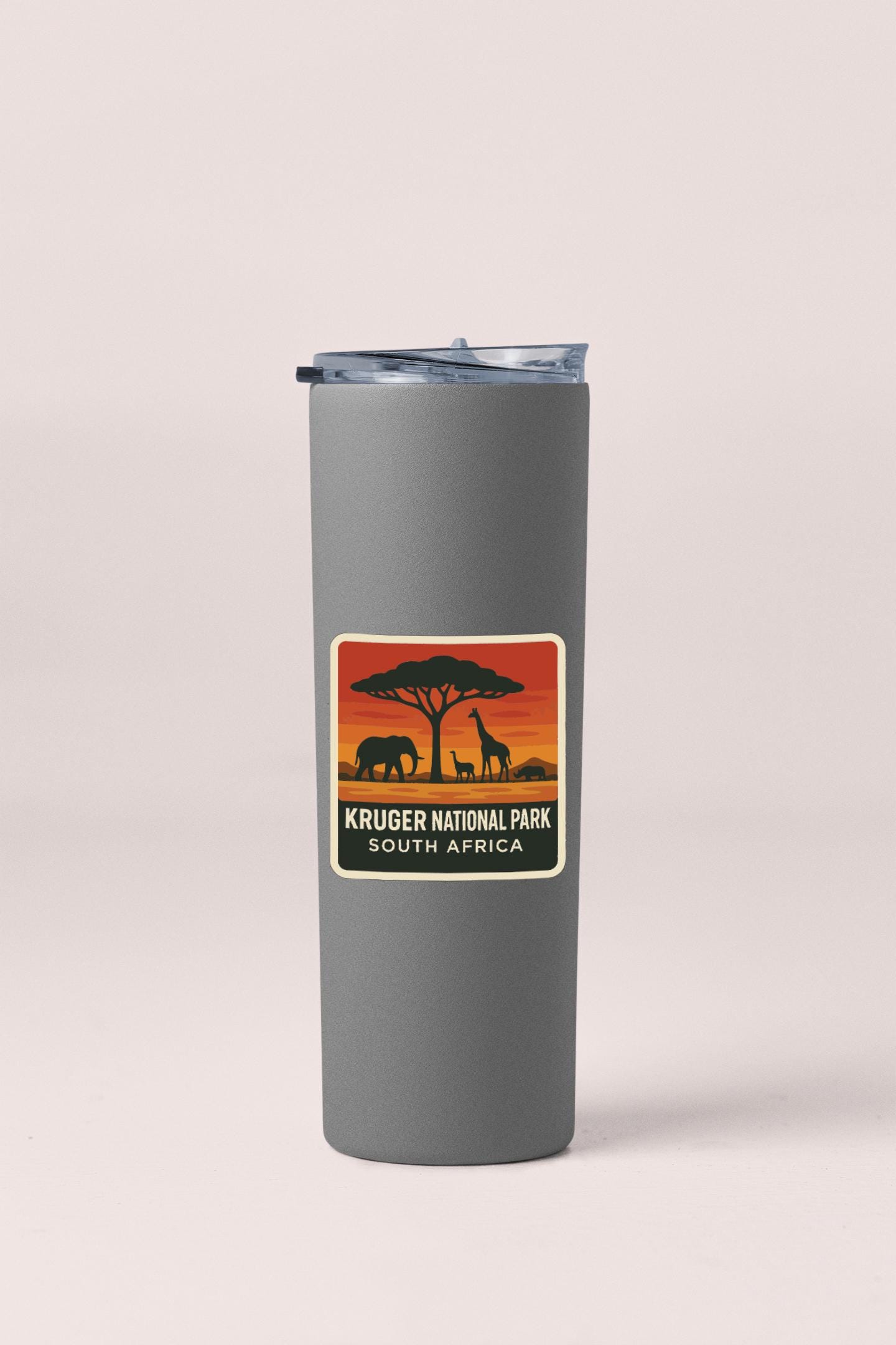 A gray insulated tumbler with a Kruger National Park South Africa label on it.