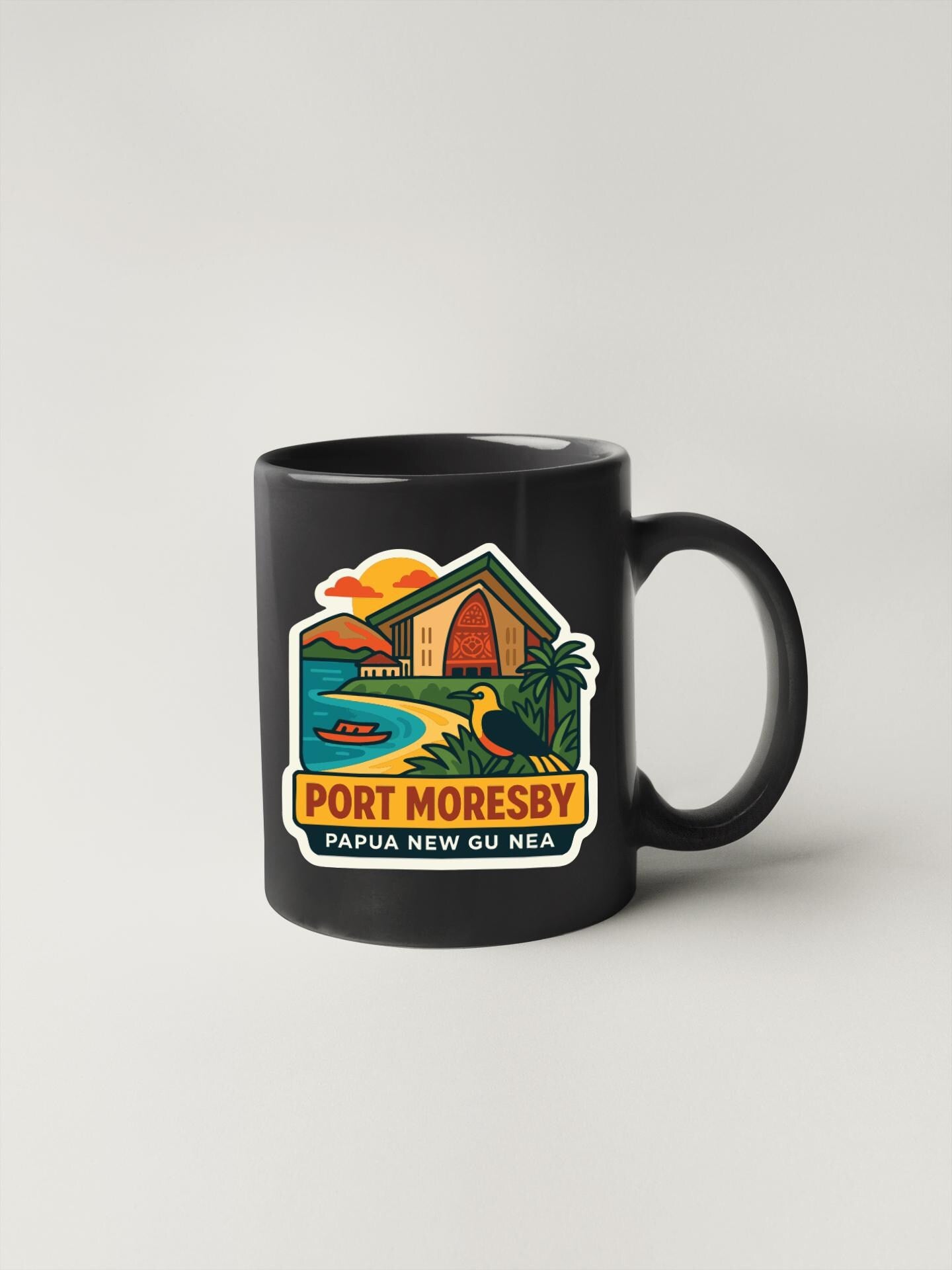 A black coffee mug with a colorful graphic depicting a tropical beach scene, including a house, palm trees, and a boat.