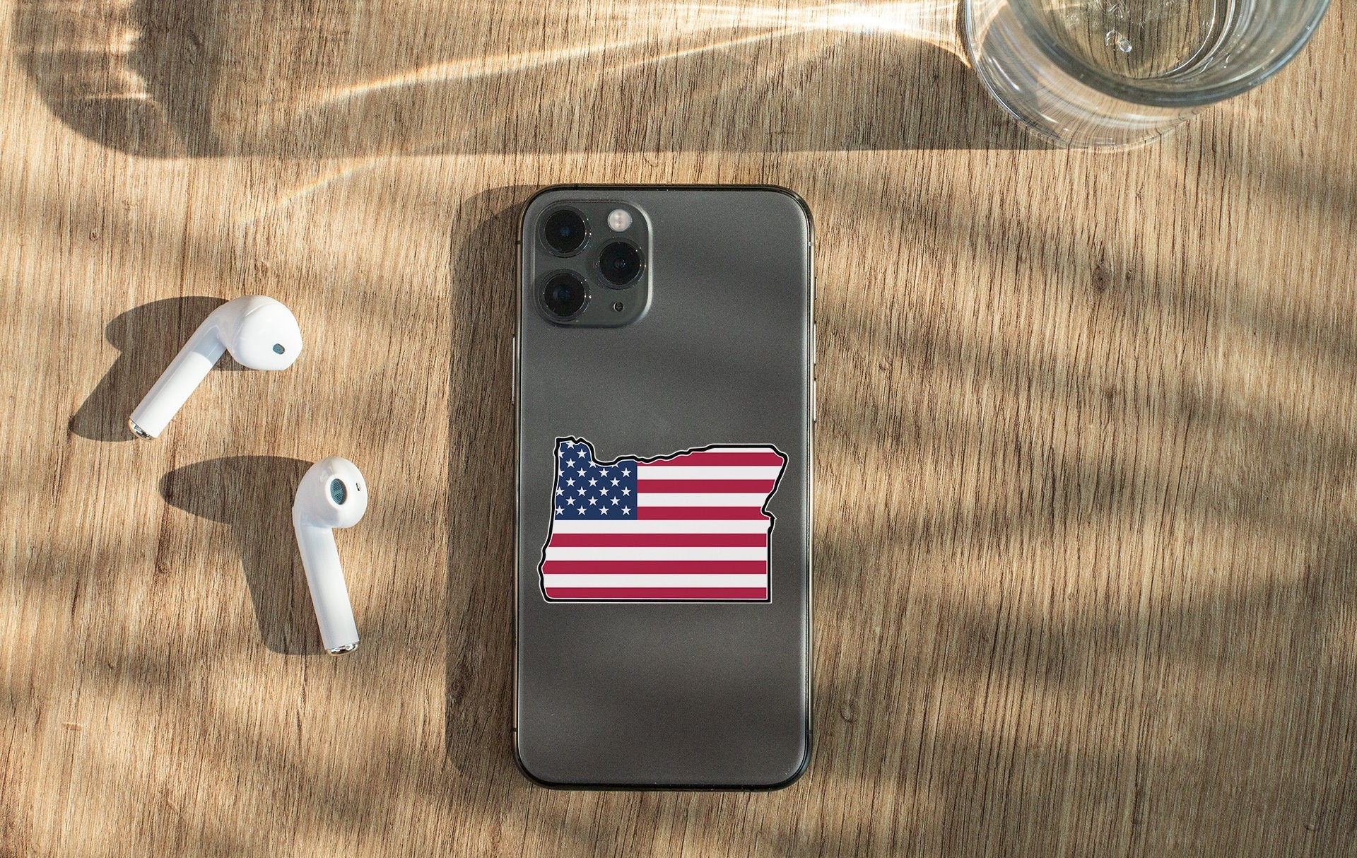 a cell phone with a sticker of an american flag
