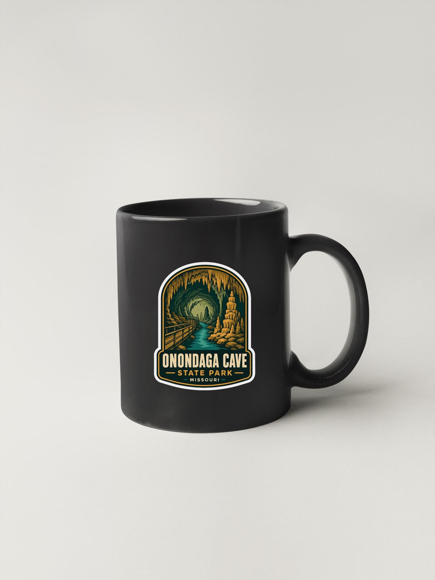 A black coffee mug with a label that says "ONONDAGA CAVE STATE PARK MISSOURI".