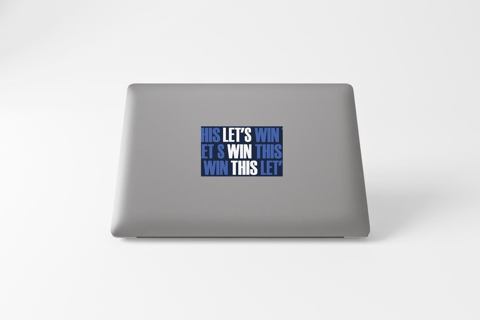 a laptop that has a sticker on it